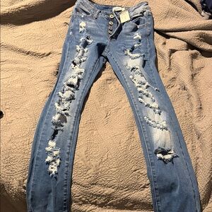 Distressed Blue Jeans